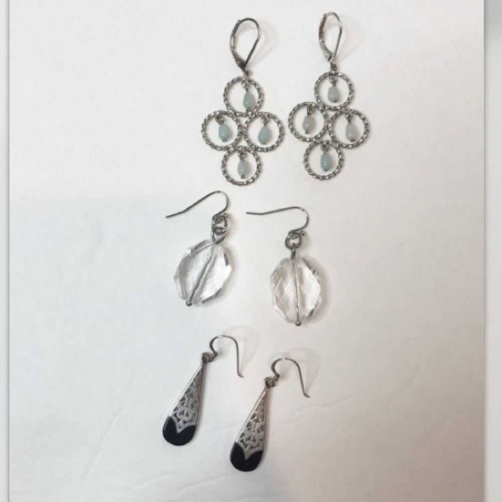 Bundle of three silver dangle earrings